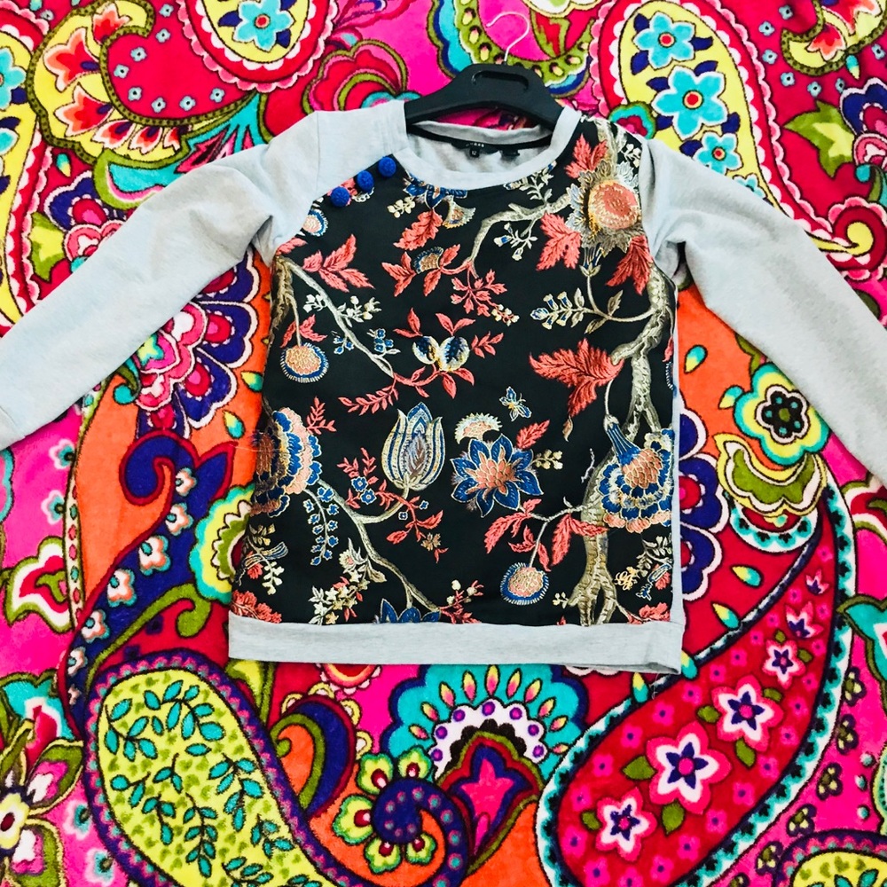 A floral sweat shirt
